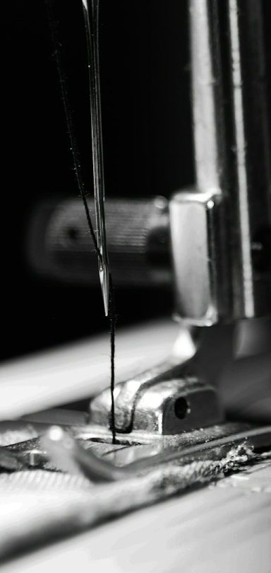 Copyright: J Williams auf Unsplash Nahaufnahme Nähmaschine